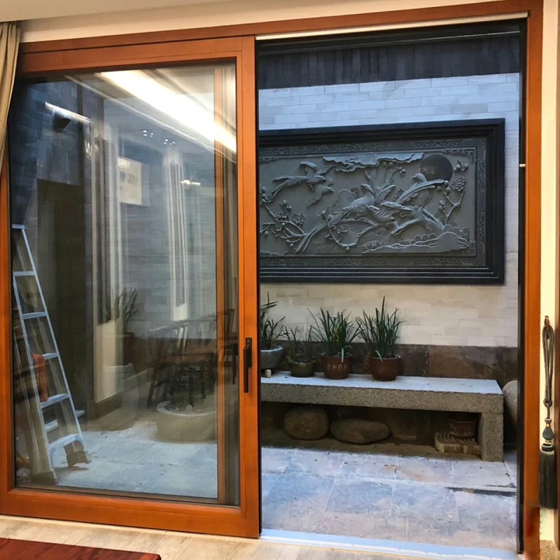 嚴嚴冬日里選擇保暖的鋁木復(fù)合門窗有多重要？